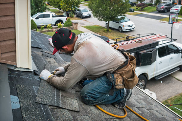 Professional Flat Roof Repair technician working in Easton, MA